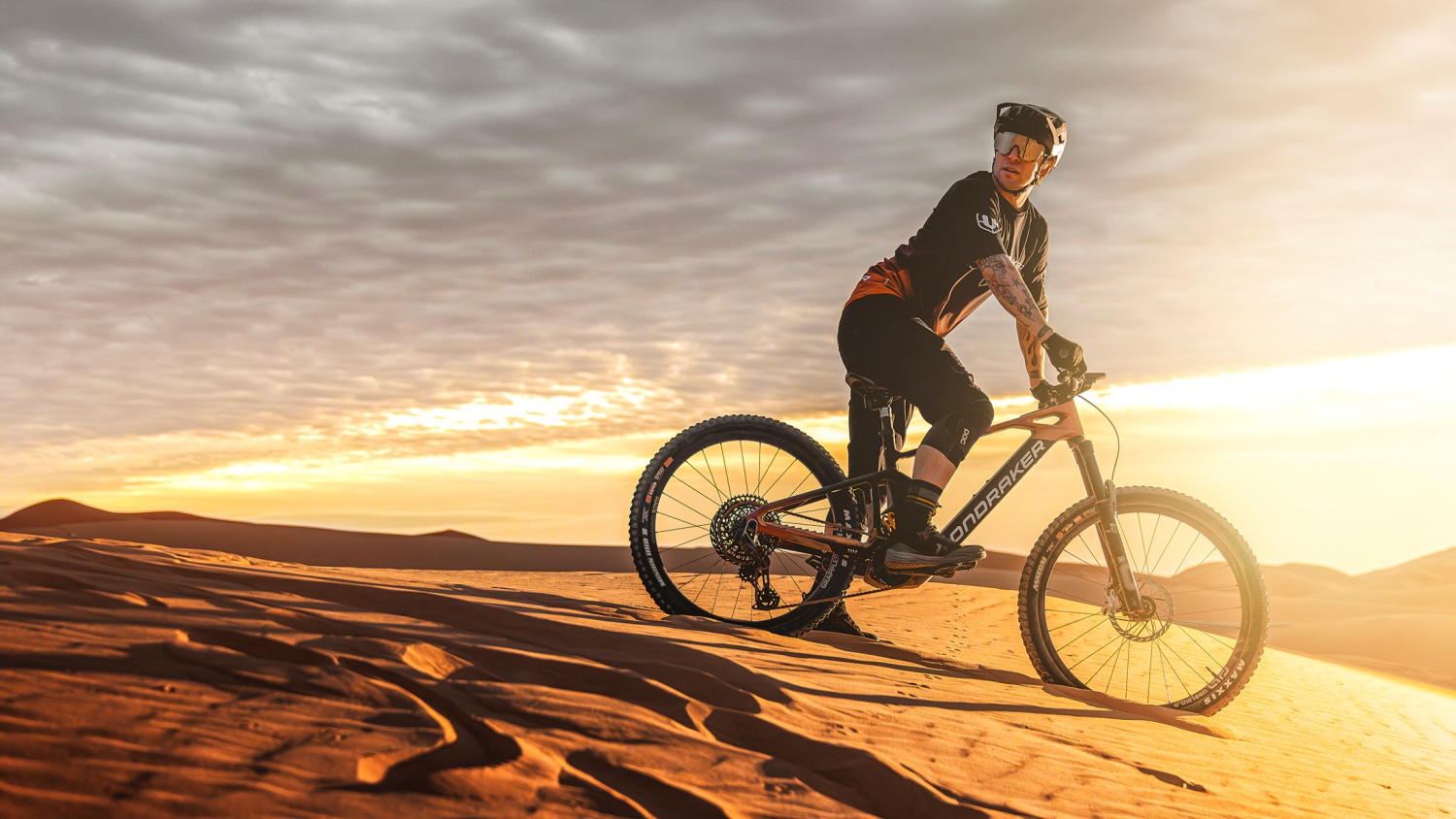 The new lightweight Mondraker in the dunes.