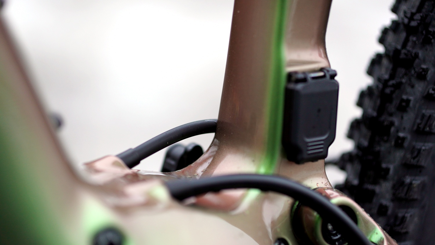 The Power button is no longer on the bottom of the downtube. The chargeport is though, it's new and easier to operate!