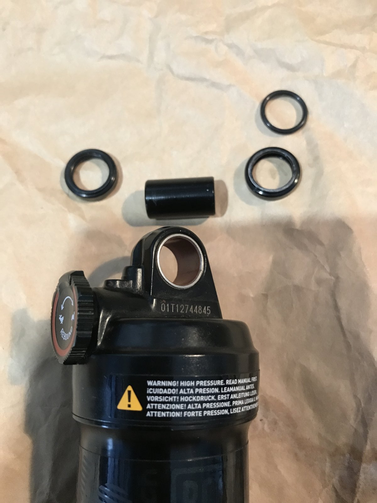 Monarch Upper Eyelet with DU Bearing installed and with pin and spacers (spacer internal oring).JPG